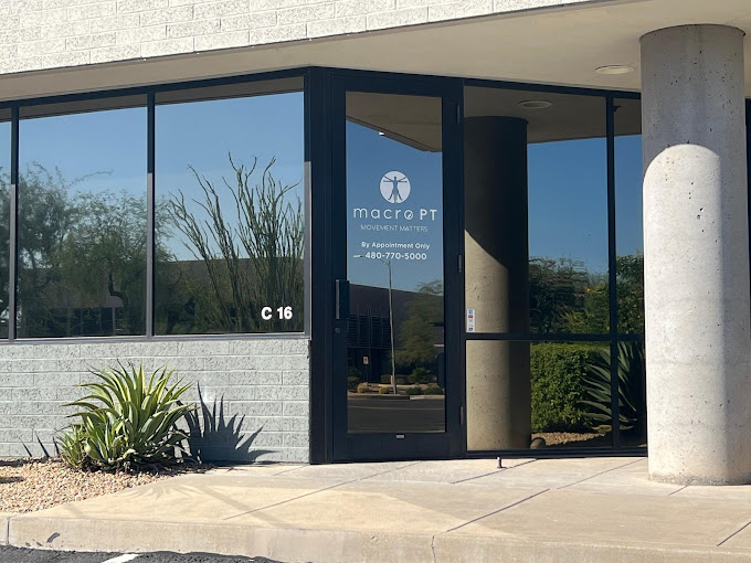 The front of a medical office building with large windows