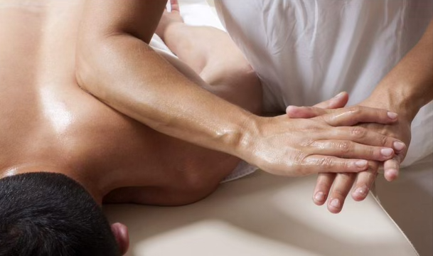 Soft tissue sports massage using elbow